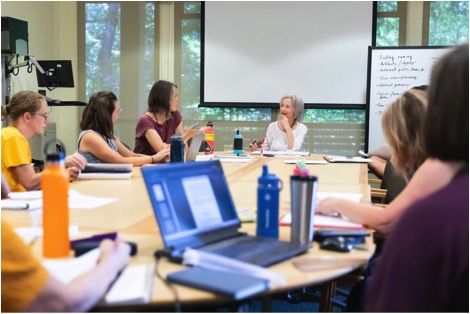 Rebecca with students at Pacific Lutheran University